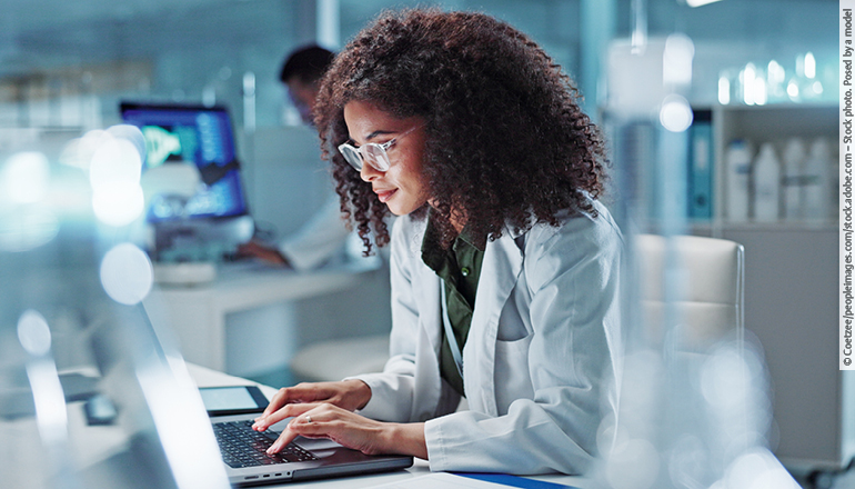 Chemist using SOS online in a laboratory